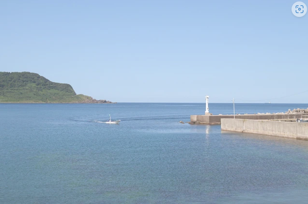地震前の2016年に撮影した石川県輪島市門前町の皆月湾(いずれも吉岡栄一さん提供)